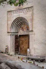 The rear entrance to Névache's Saint-Marcellin church - © Alpes photographies