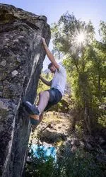 Bouldering at Les Balmes climbing site - © T.Blais
