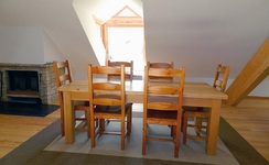 The dining area with the fireplace - © ©congesbenedicte