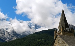 The bell tower of the church of La Grave - © ©congesbenedicte