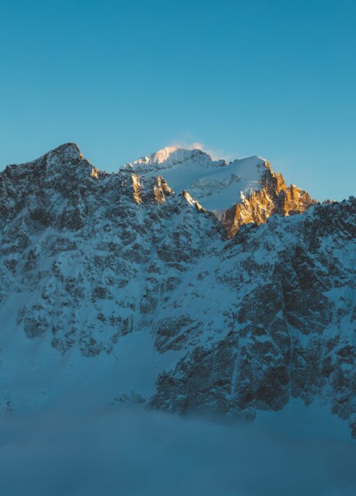 Paysages depuis Adèle Planchard, mer de nuage, la Barre des Écrins coucher de soleil, hiver ©Arthur Delicque - collection FFCAM (5) (1)